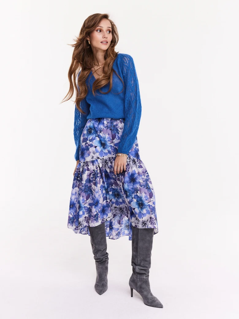 Blue sweater with openwork sleeves