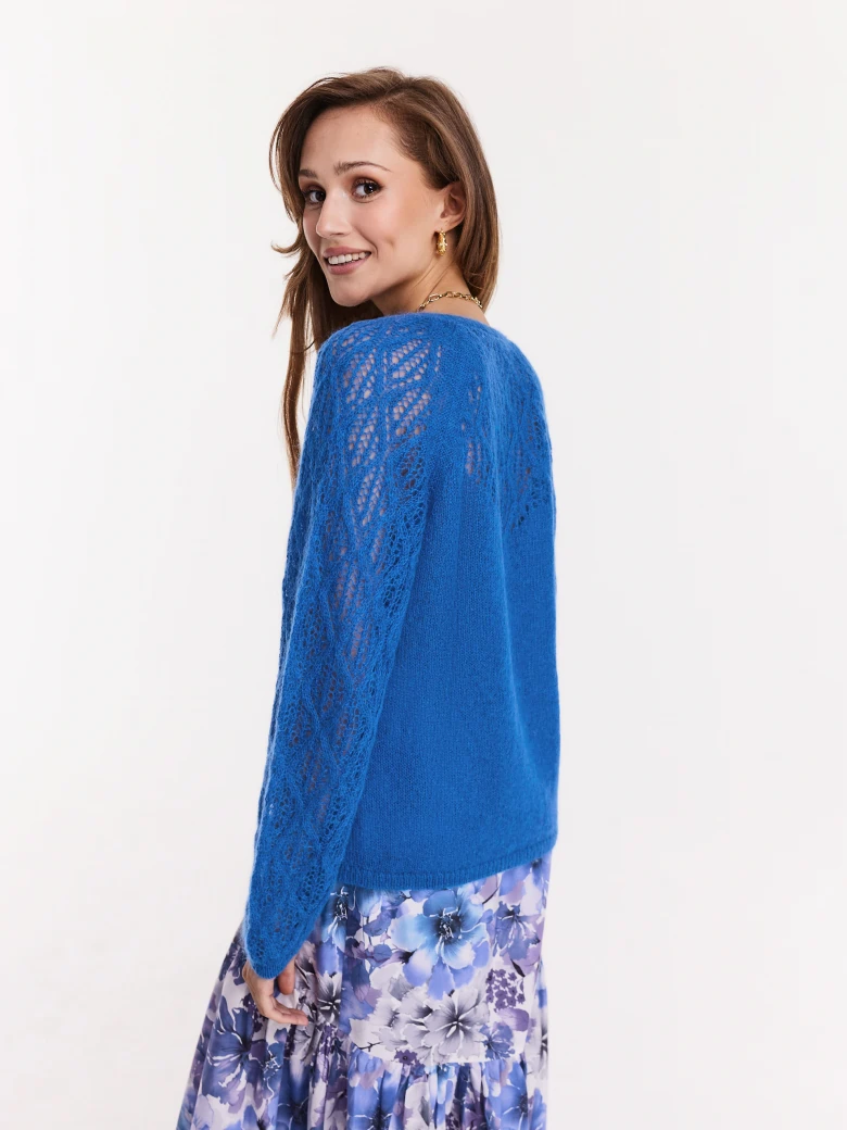 Blue sweater with openwork sleeves