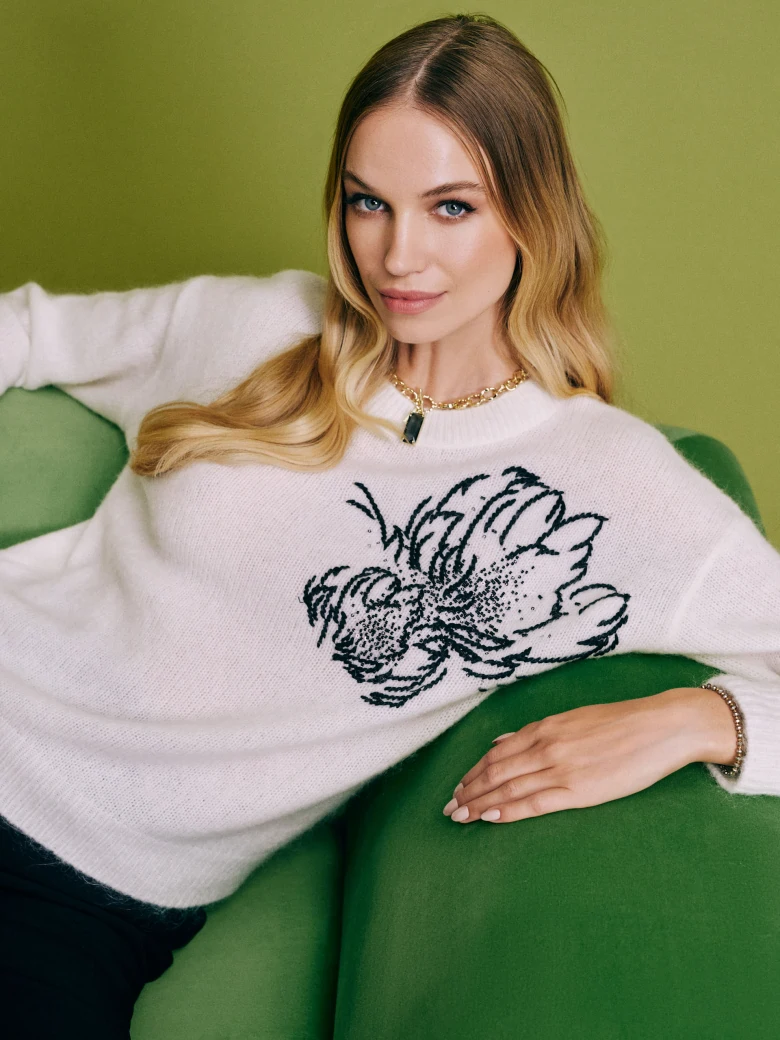 White sweater with applique
