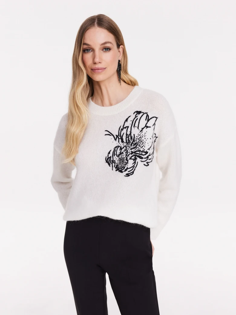 White sweater with applique