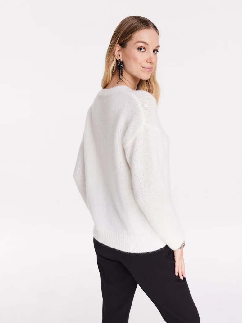 White sweater with applique