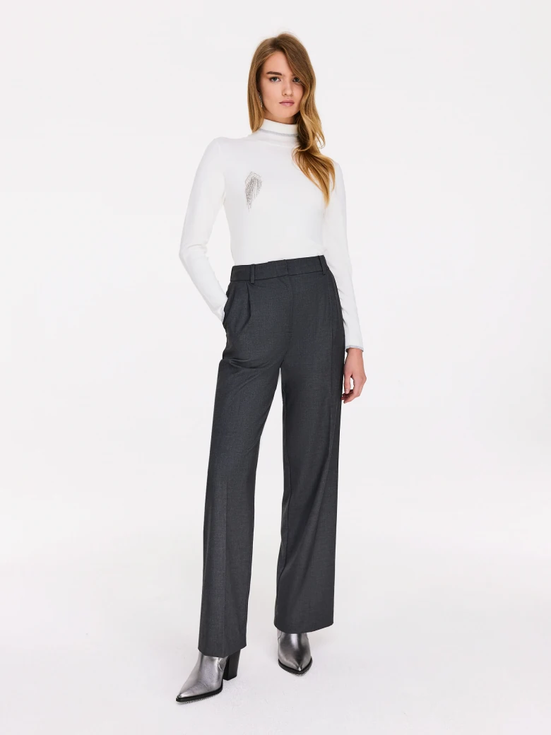 Fitted white turtleneck sweater