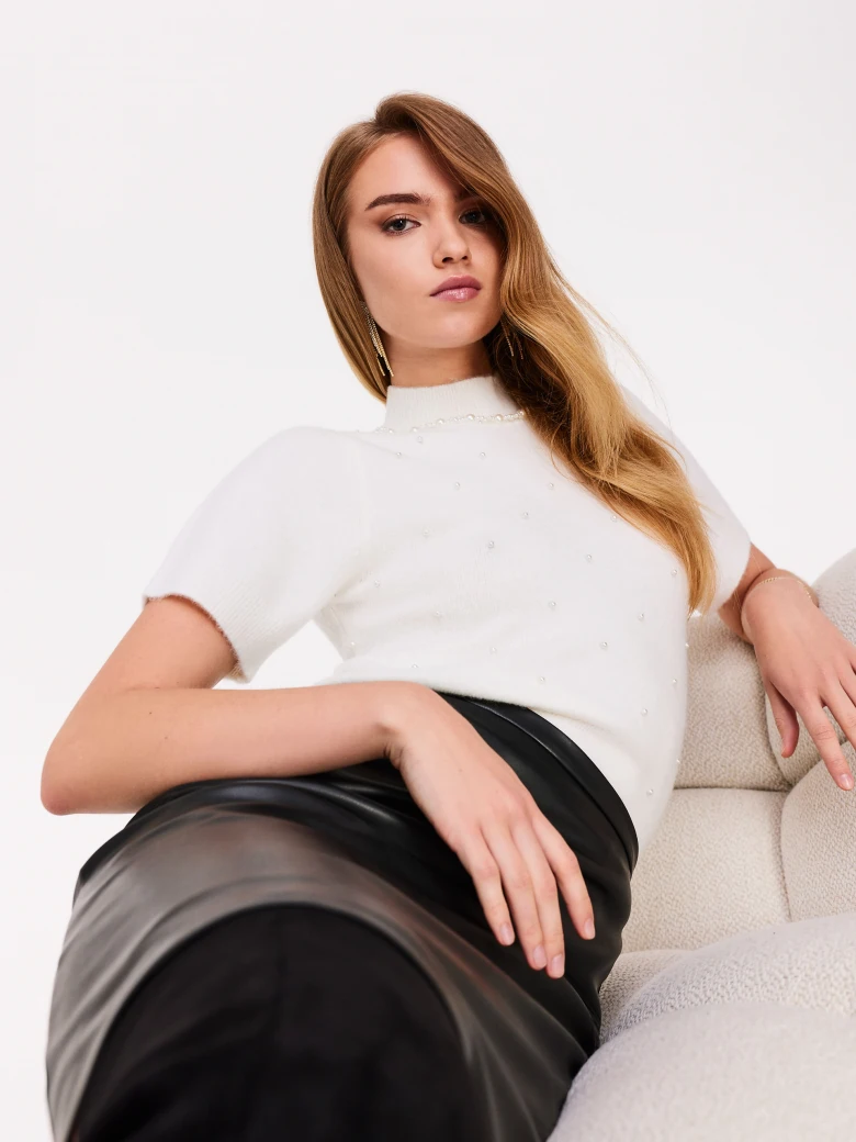 White sweater with short sleeves and half turtleneck
