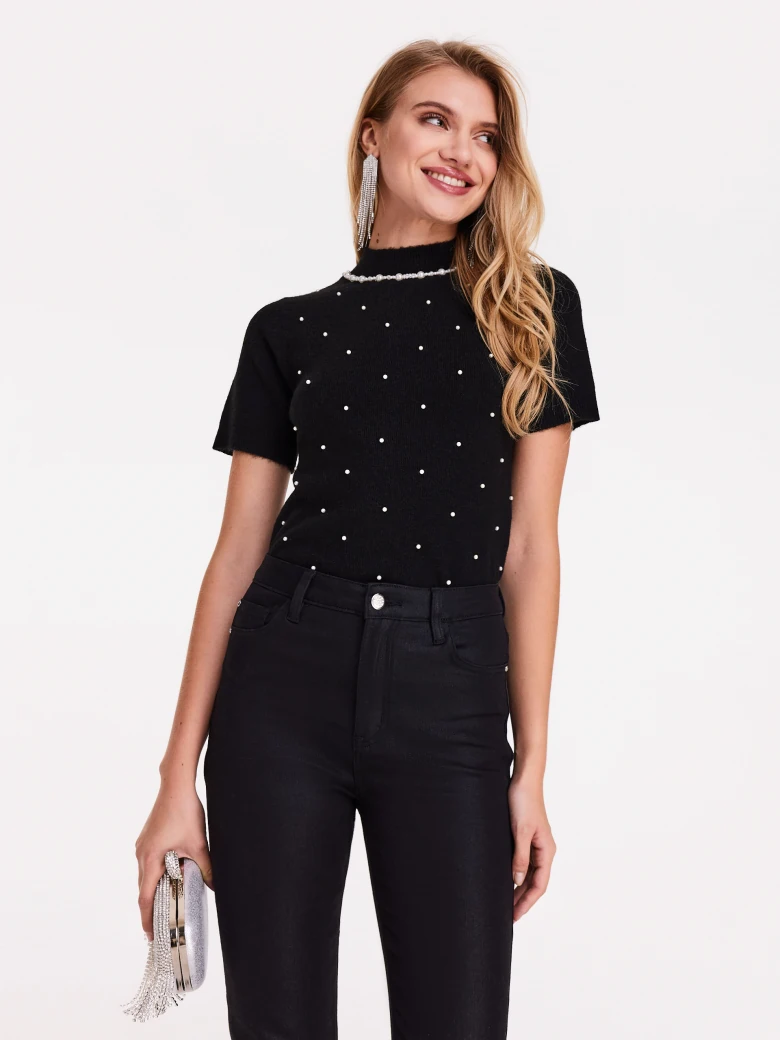 Black sweater with short sleeves and half turtleneck