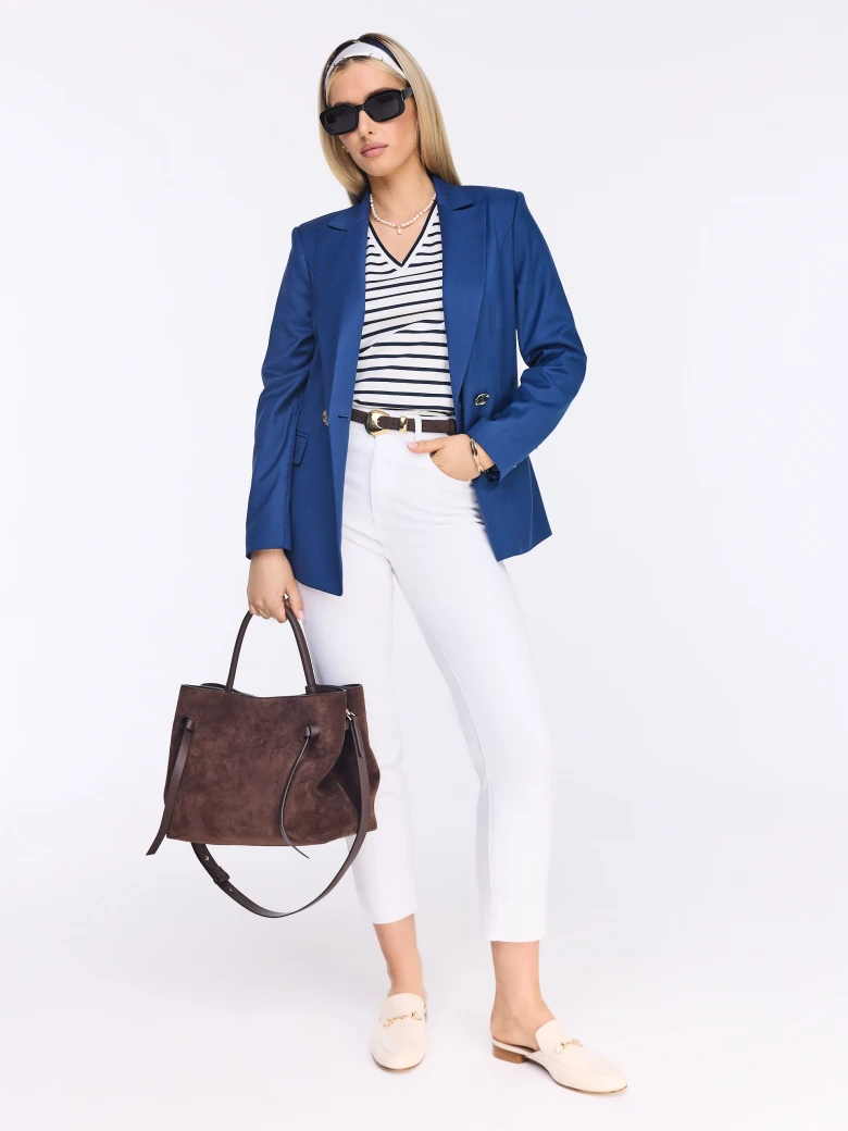 White blouse with navy blue stripes and a V-neck