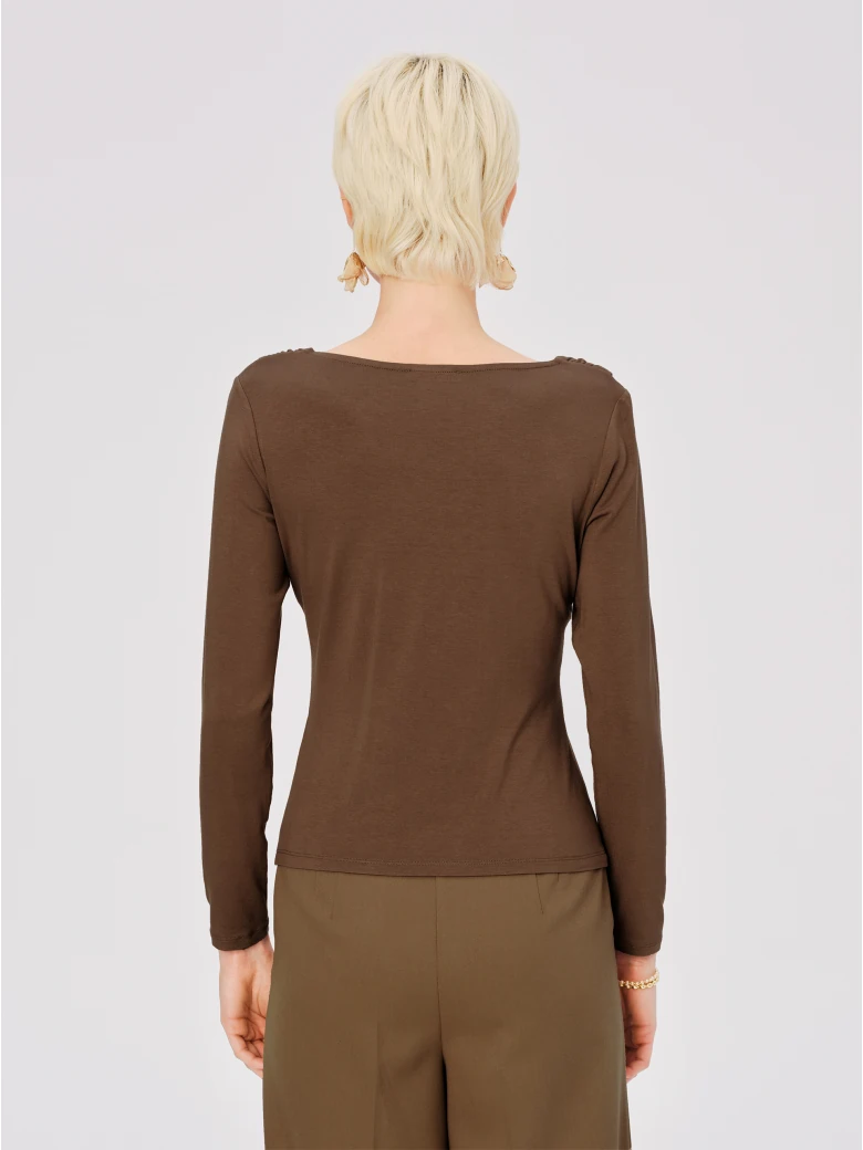 Chocolate blouse with neckline and rose