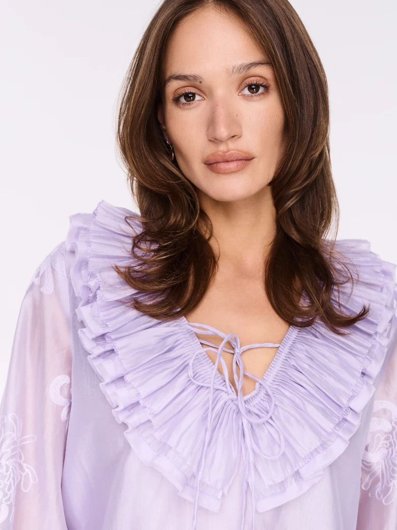 Lilac lyocell blouse with frill and tie