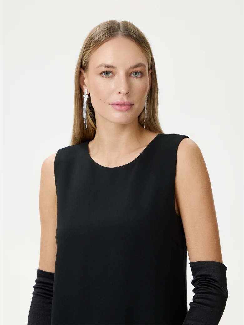 Black dress with a jewelry chain on the back