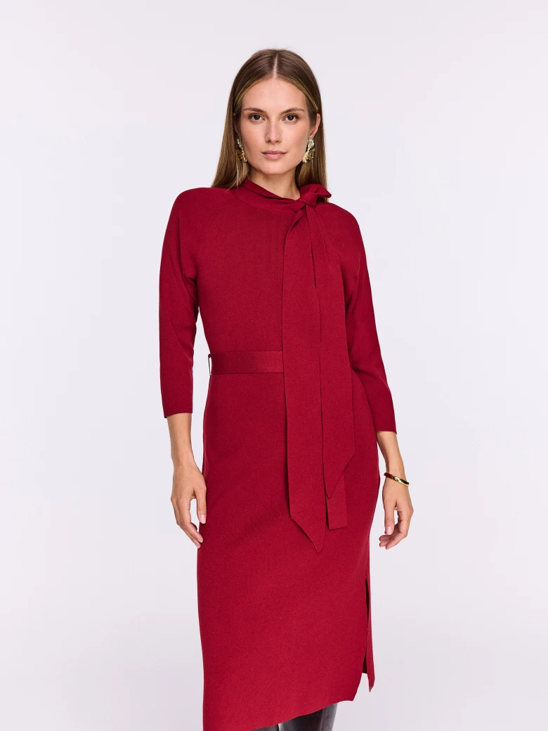 Burgundy knit dress with a tie at the neckline