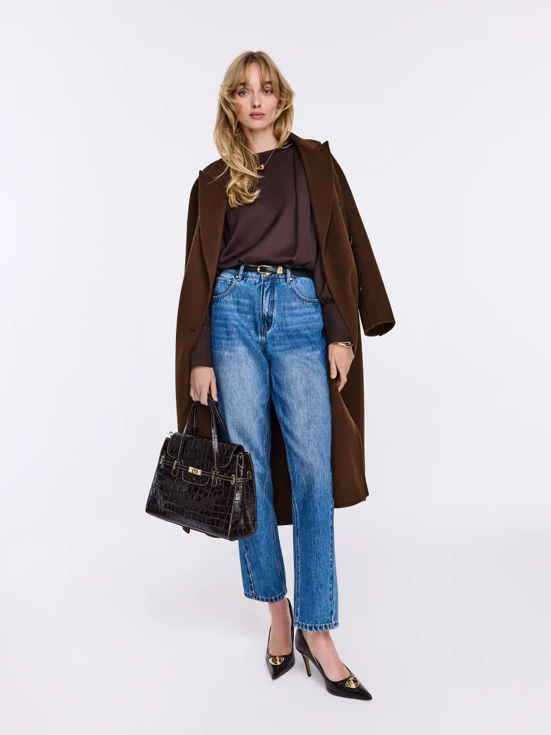 Blue distressed jeans with stitching