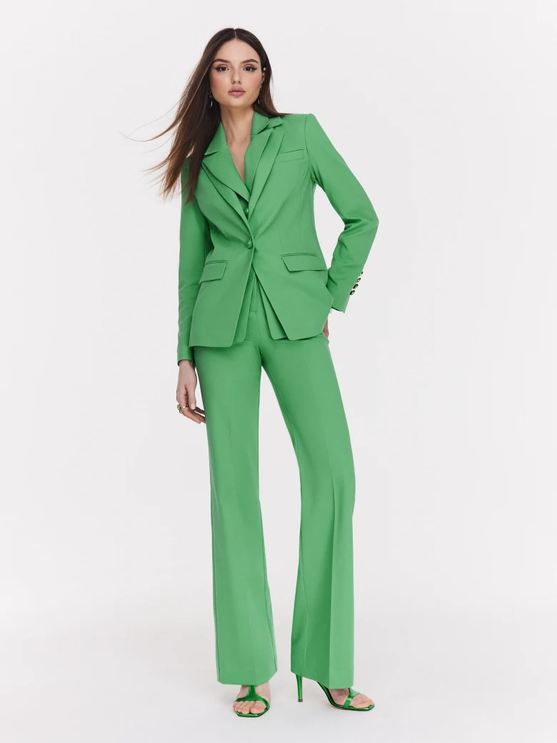 Classic green jacket with a single button closure
