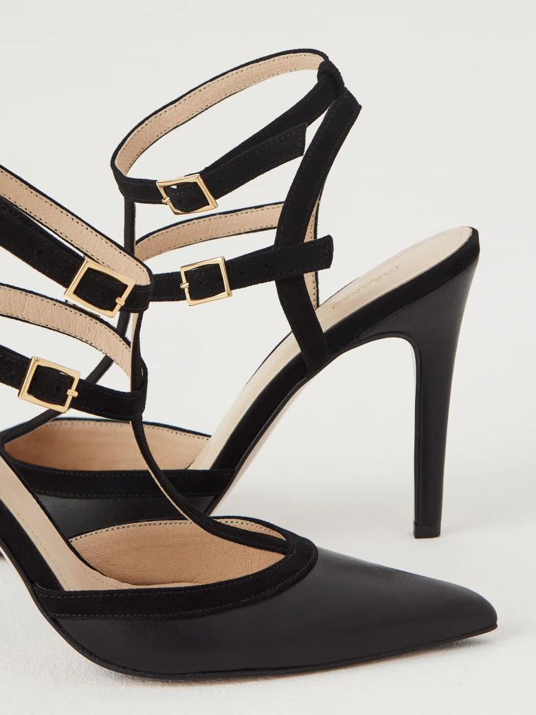 Black leather pumps