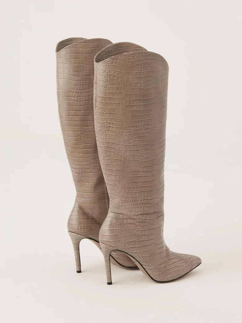 Beige stiletto heeled boots