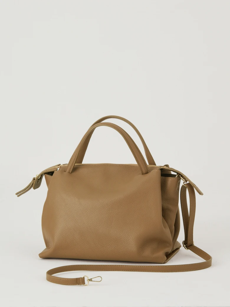 Brown natural leather travel bag