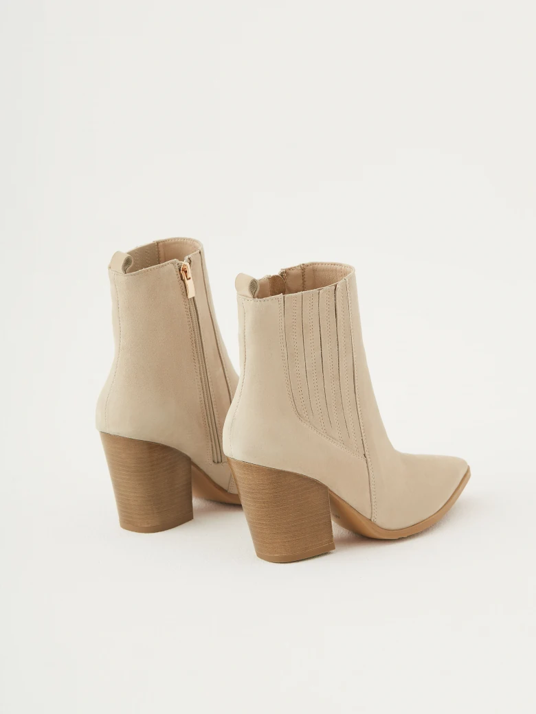 Beige leather heeled cowboy boots