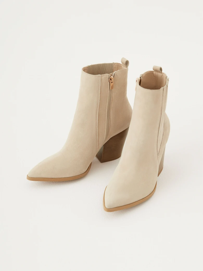 Beige leather heeled cowboy boots