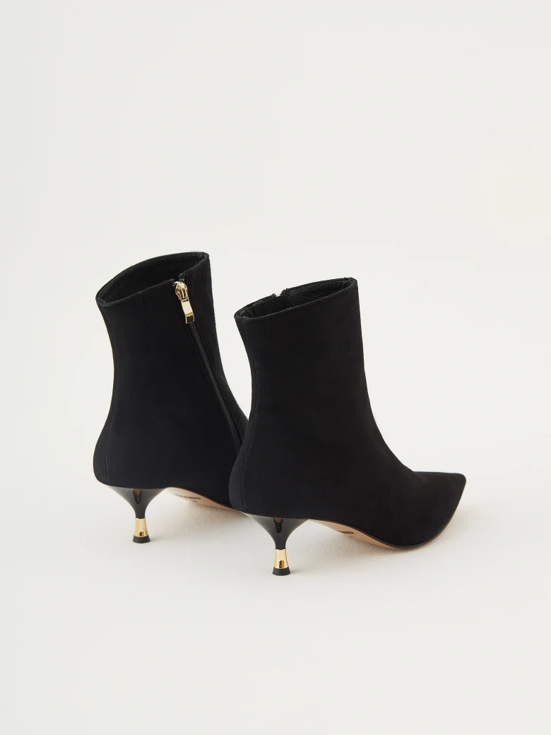 Black suede boots with gold elements