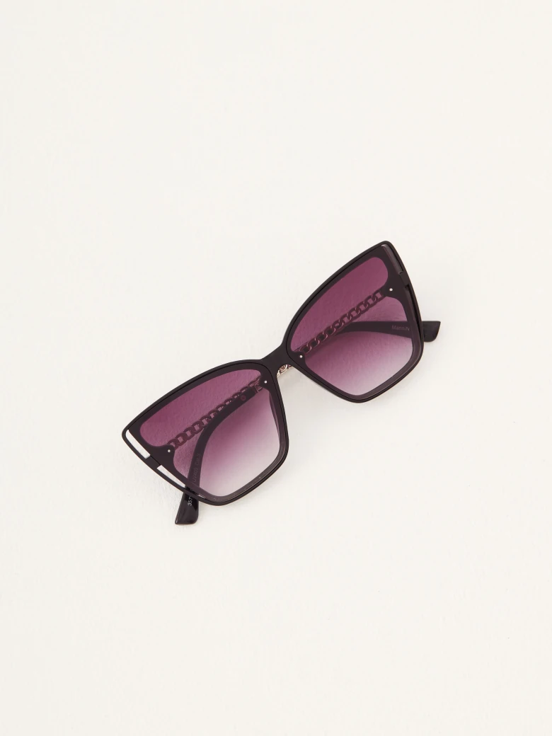 Black cat-eye glasses with ornaments