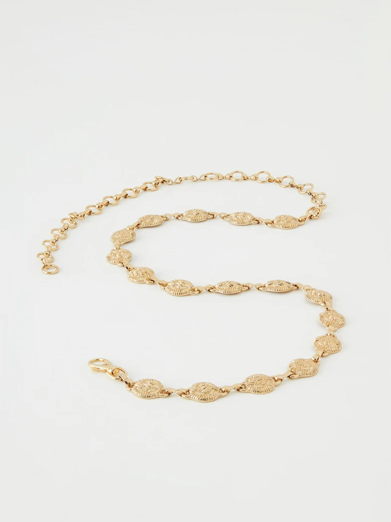 Metal strap with fluted links