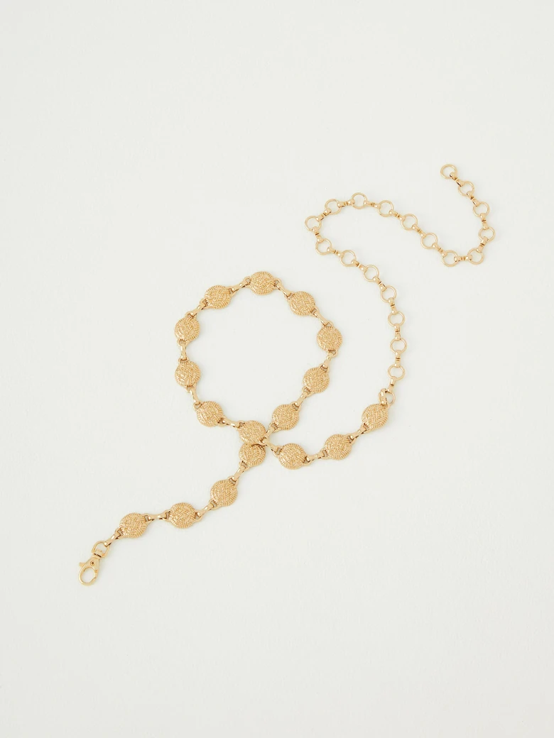 Metal strap with fluted links