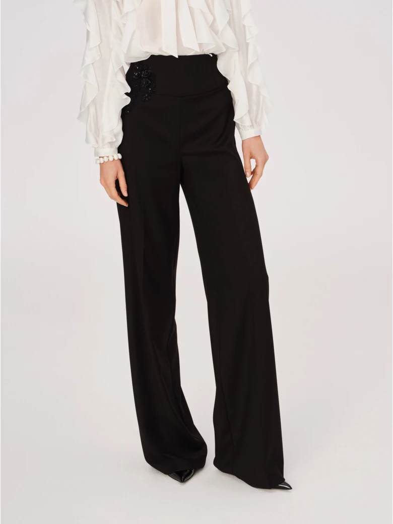 Elegant black pants with jeweled appliqué