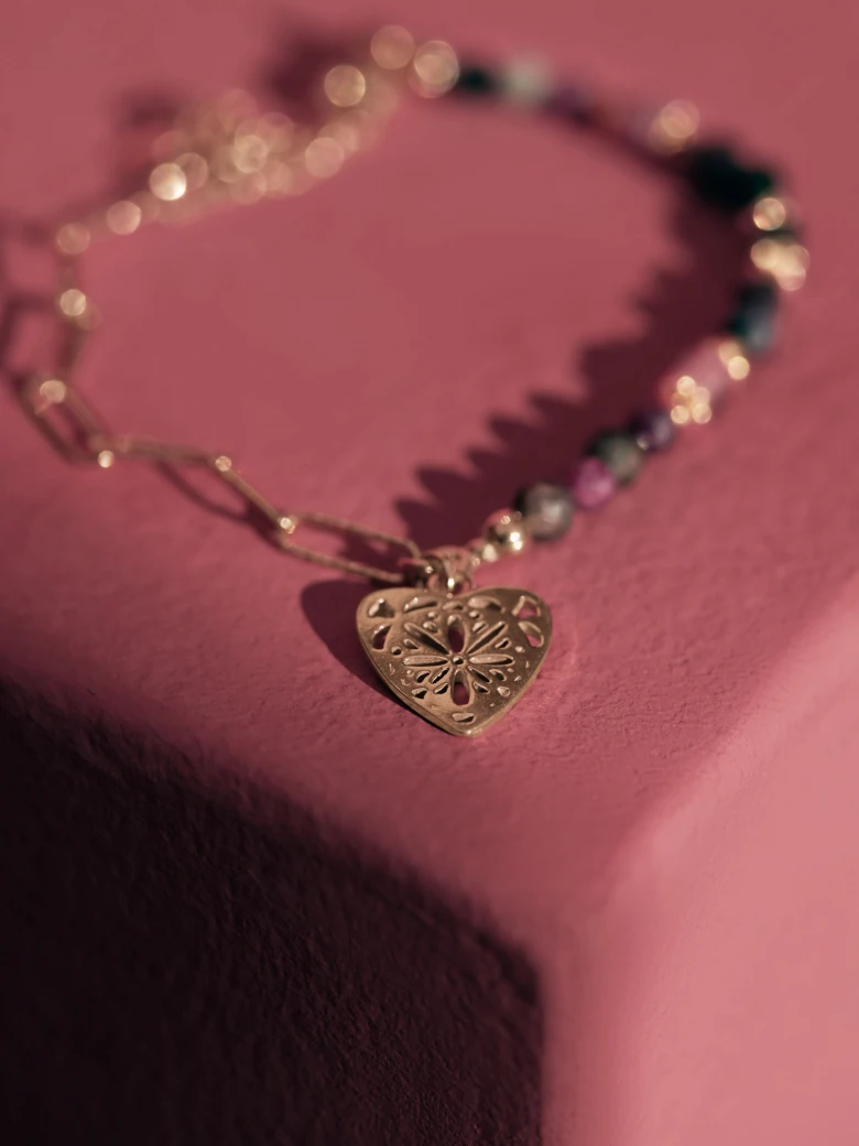 BRACELET WITH HEART-SHAPED PENDANT