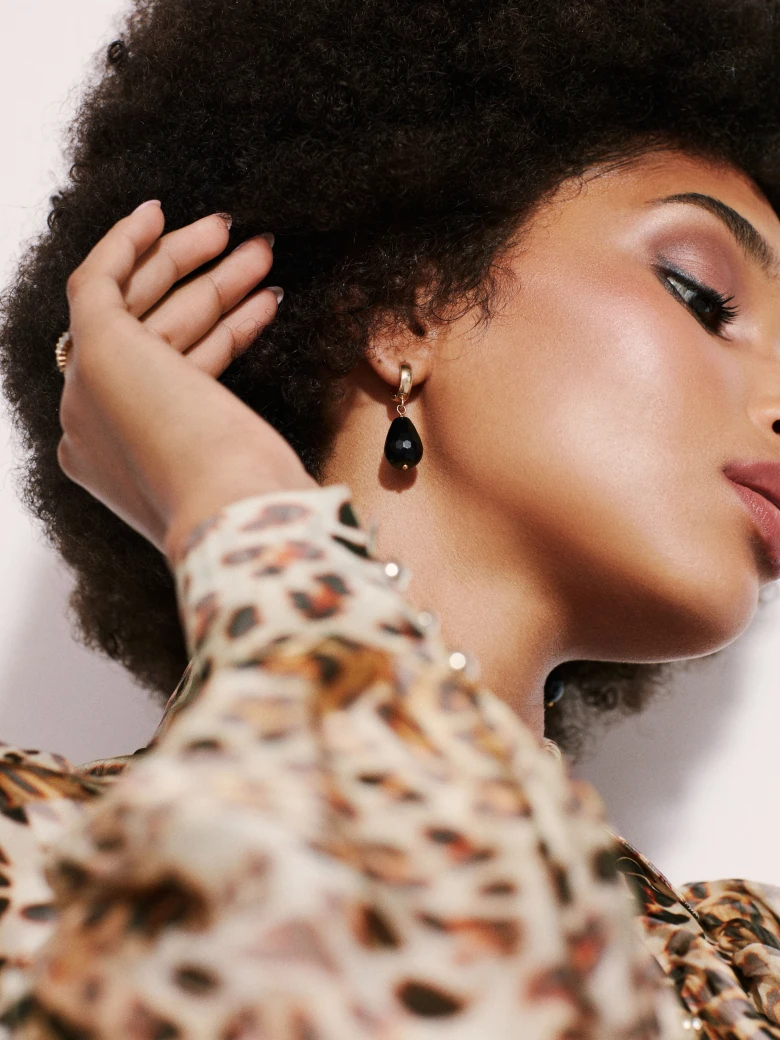 Classic earrings with decorative onyx