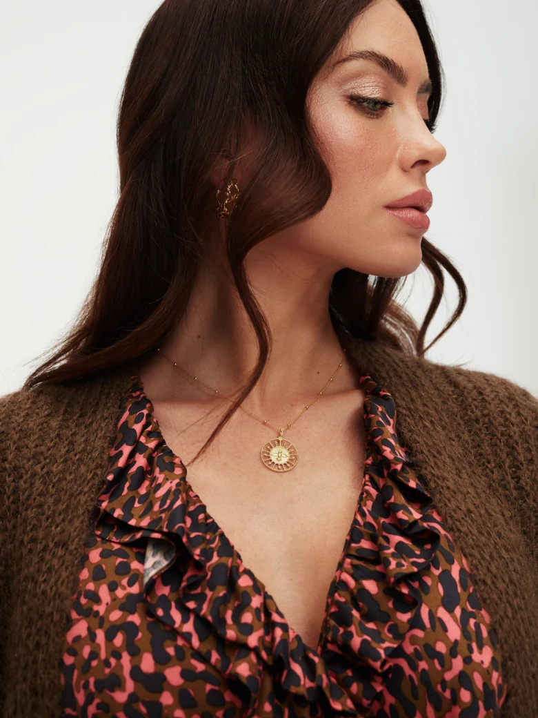 Necklace with openwork charm