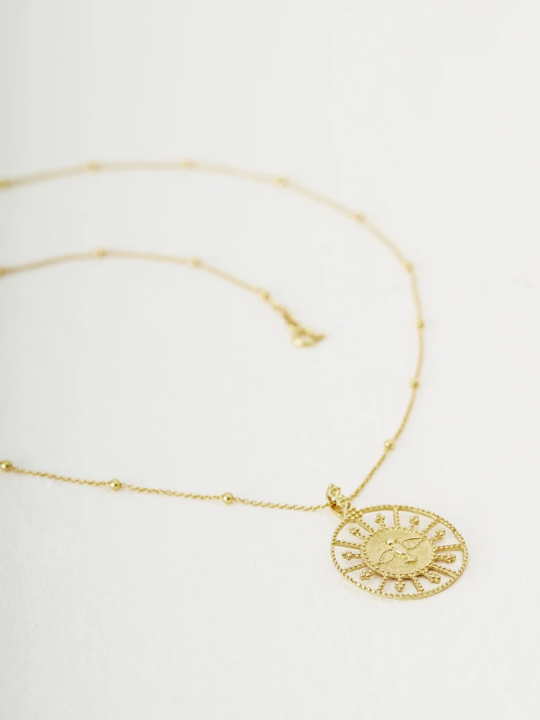Necklace with openwork charm