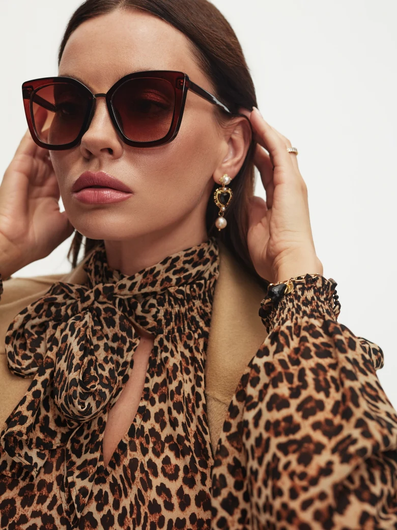Brown sunglasses in cat-eye shape