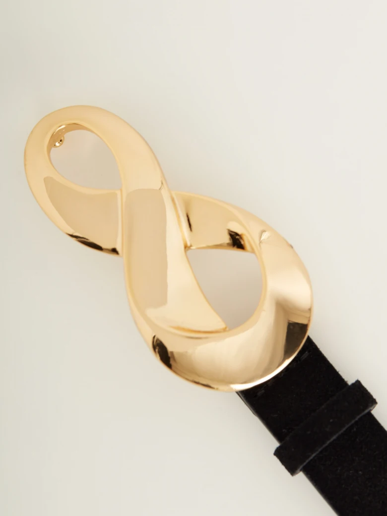 Thin leather belt with decorative buckle