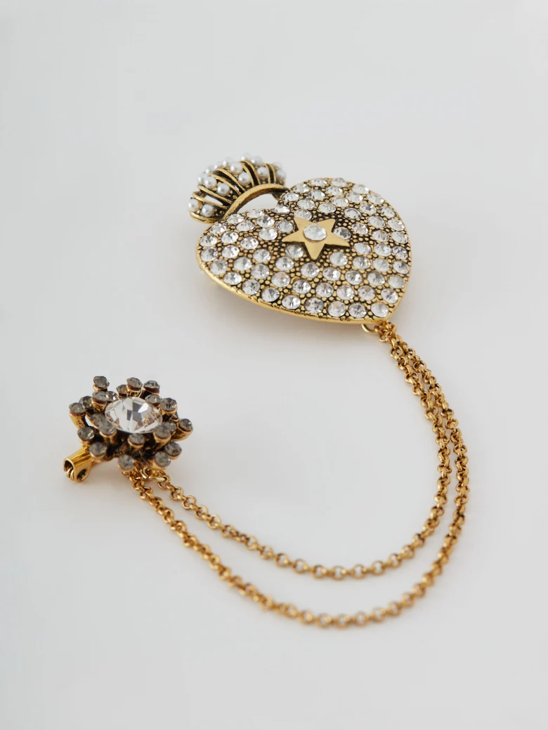 Brooch with decorative pendants