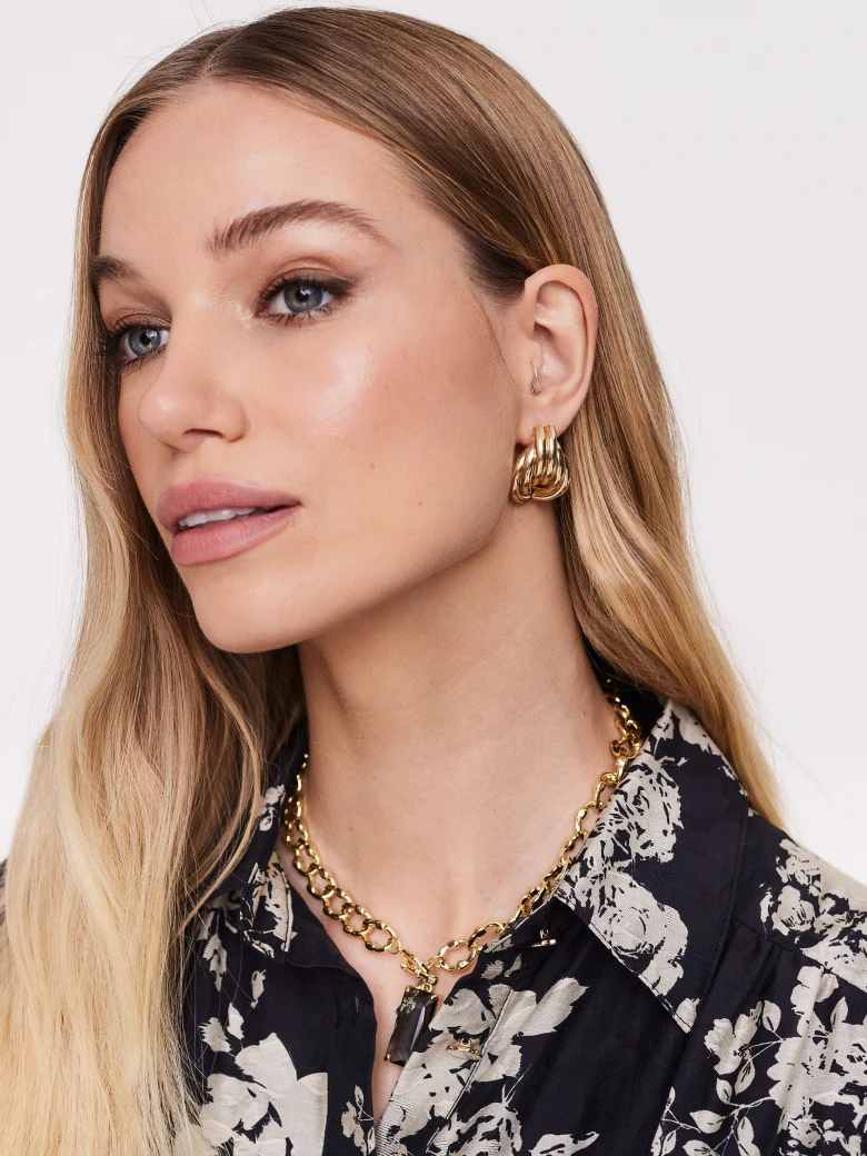 Gold fluted metal earrings
