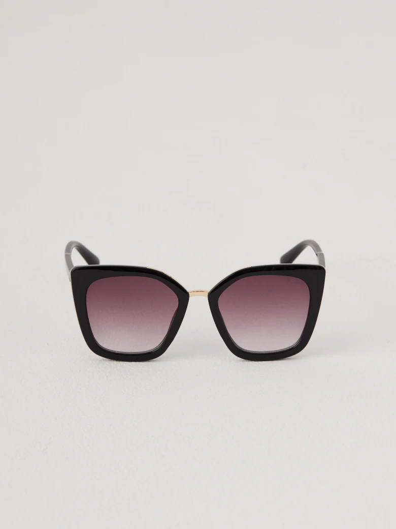 Black sunglasses with decorative inserts
