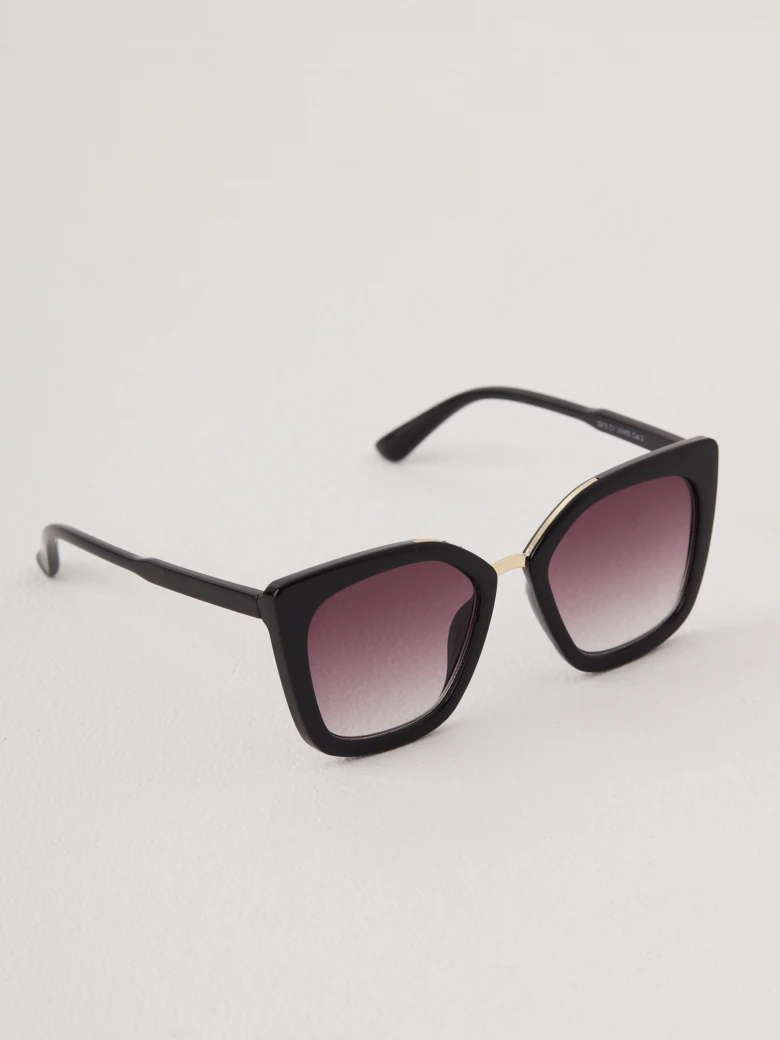 Black sunglasses with decorative inserts