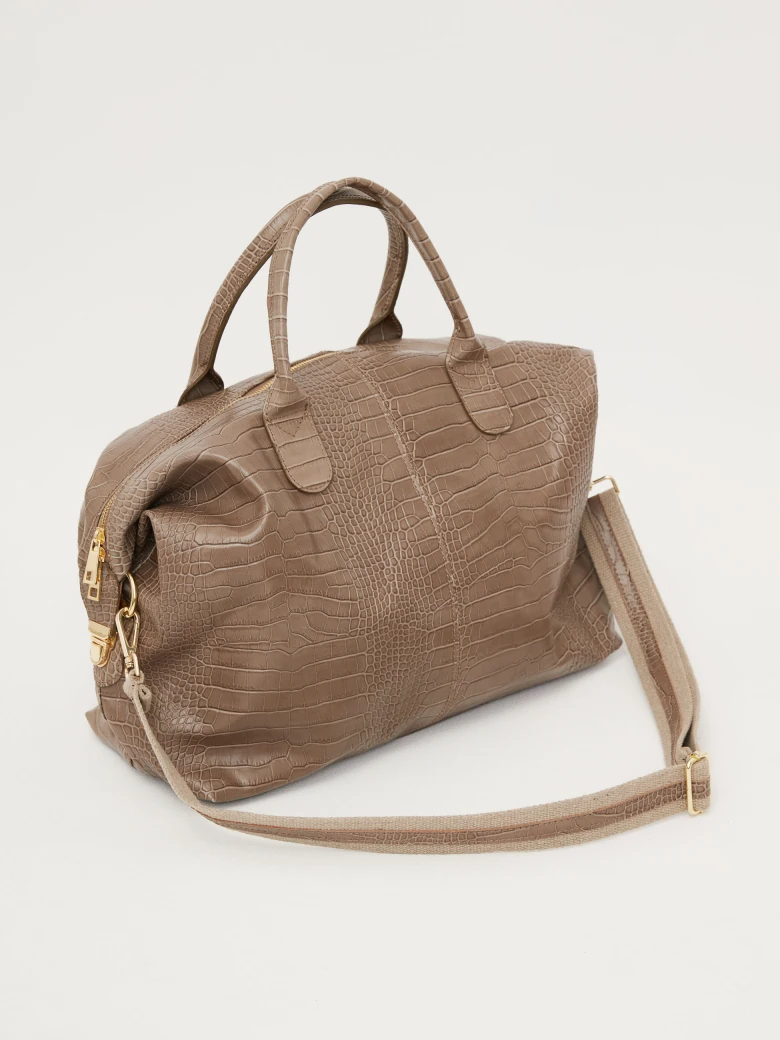 Beige travel bag with crocodile texture