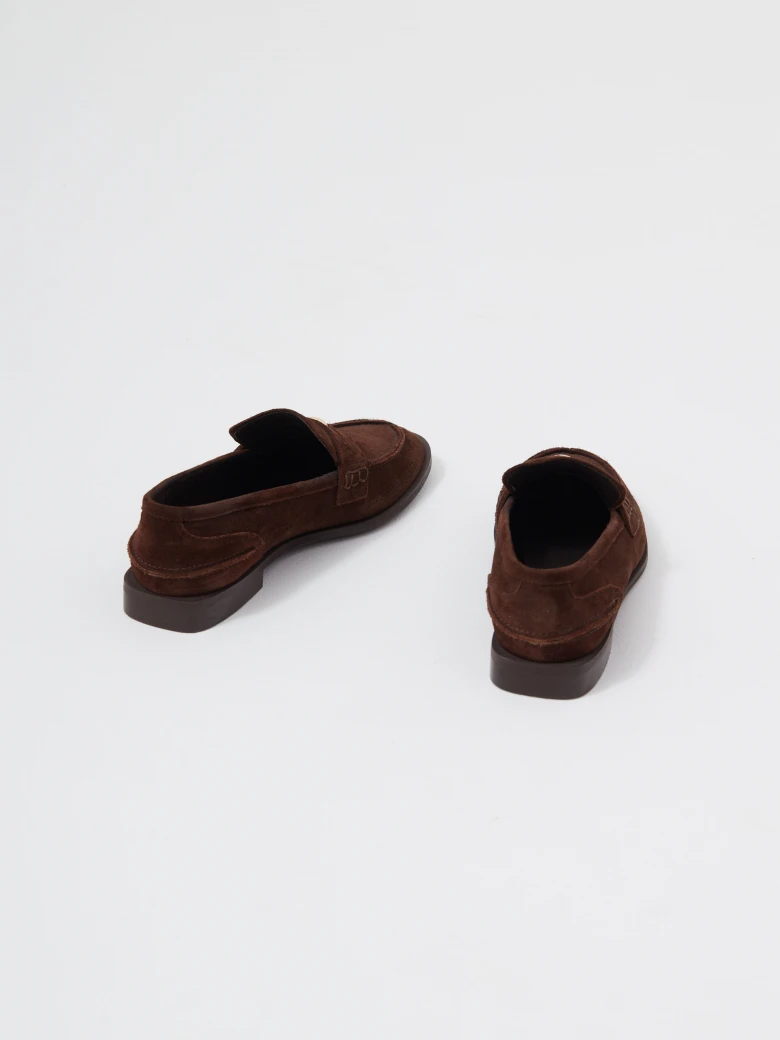 Chocolate brown moccasins made of natural leather