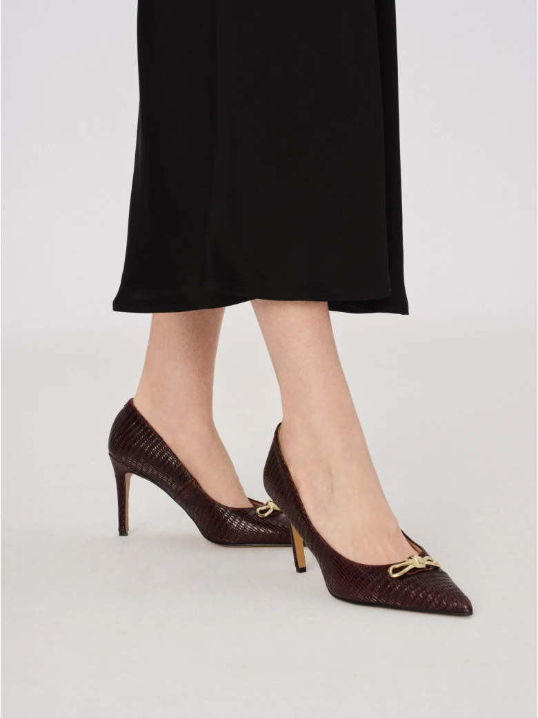 Burgundy leather pumps with decorative bows