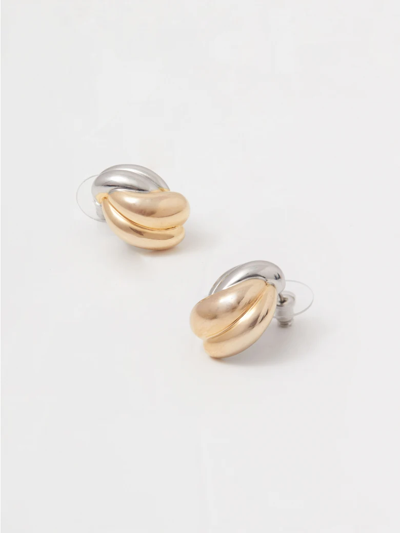 Gold and silver knot-shaped earrings