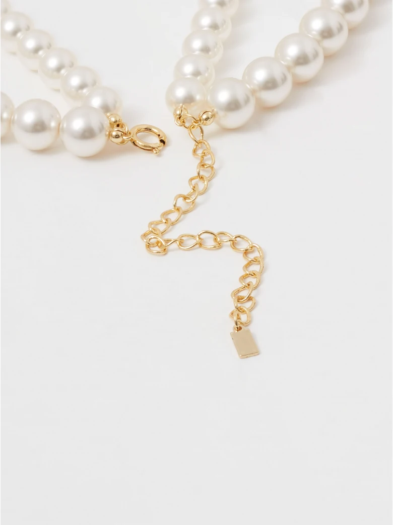 Double-strand necklace with glass pearls