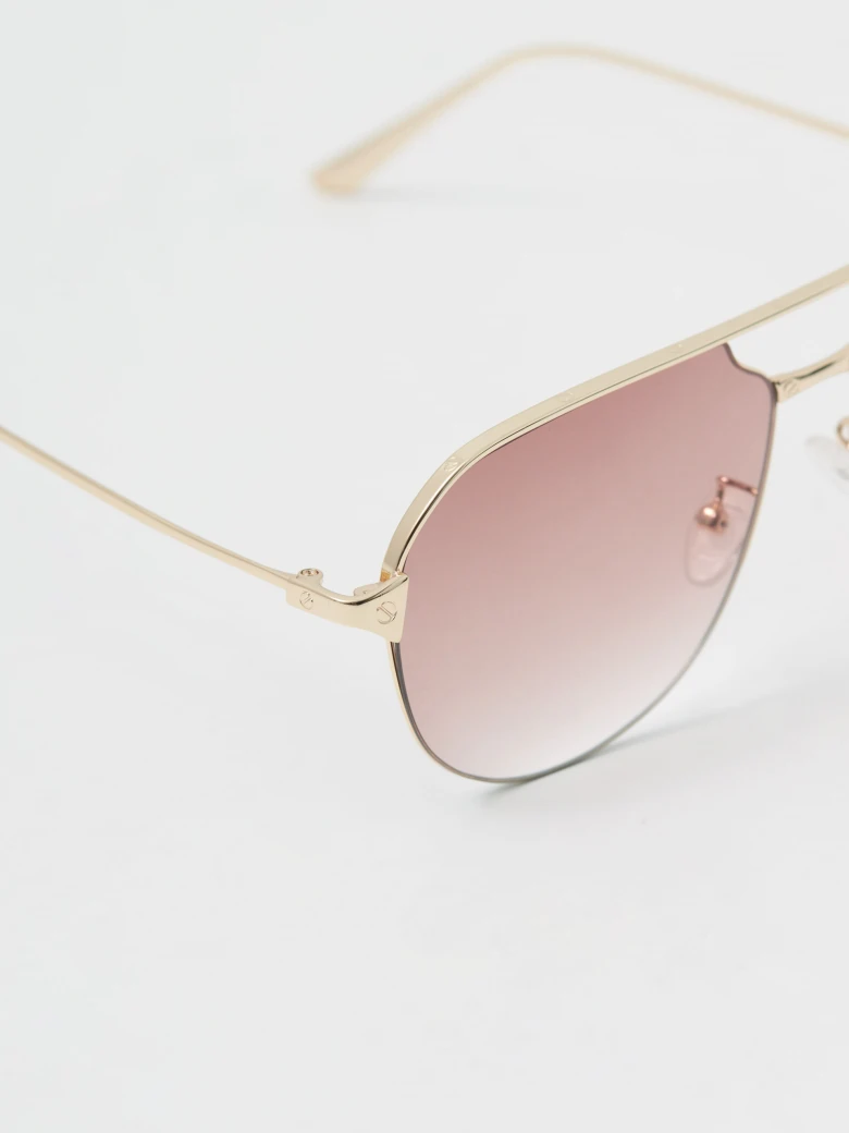 Gold-colored sunglasses