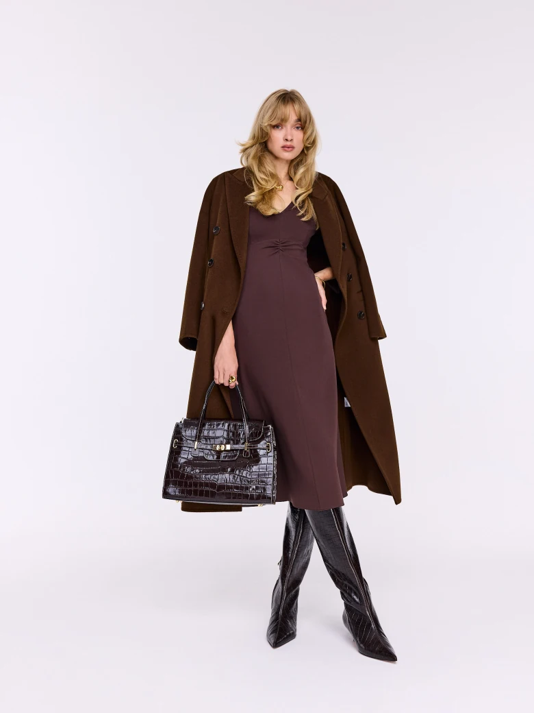 Chocolate leather bag with animal print