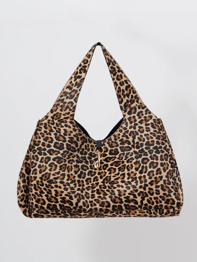 Leather handbag with a leopard print and fur texture
