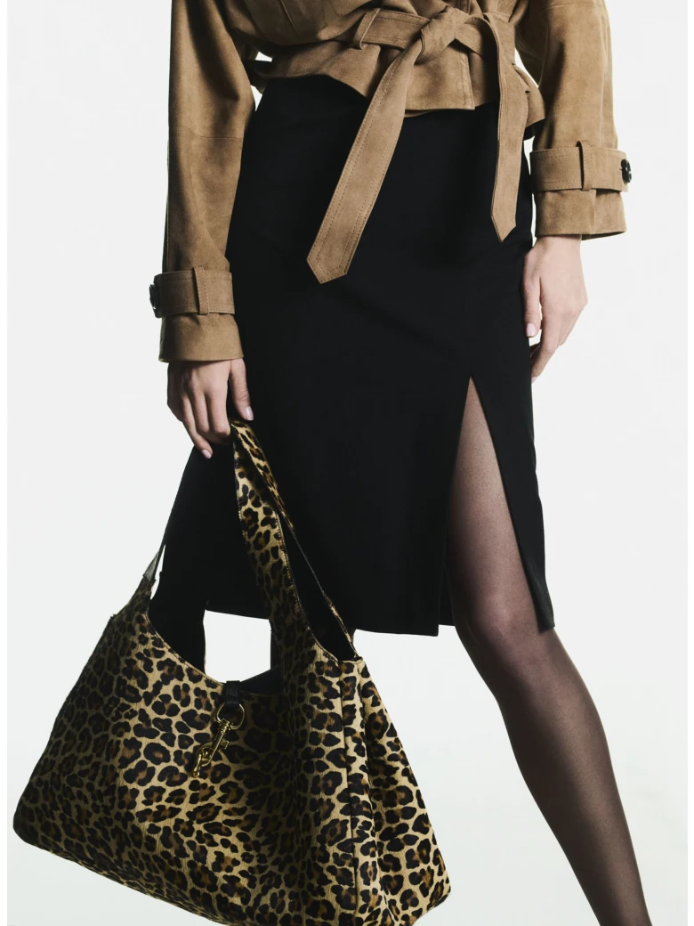 Leather handbag with a leopard print and fur texture