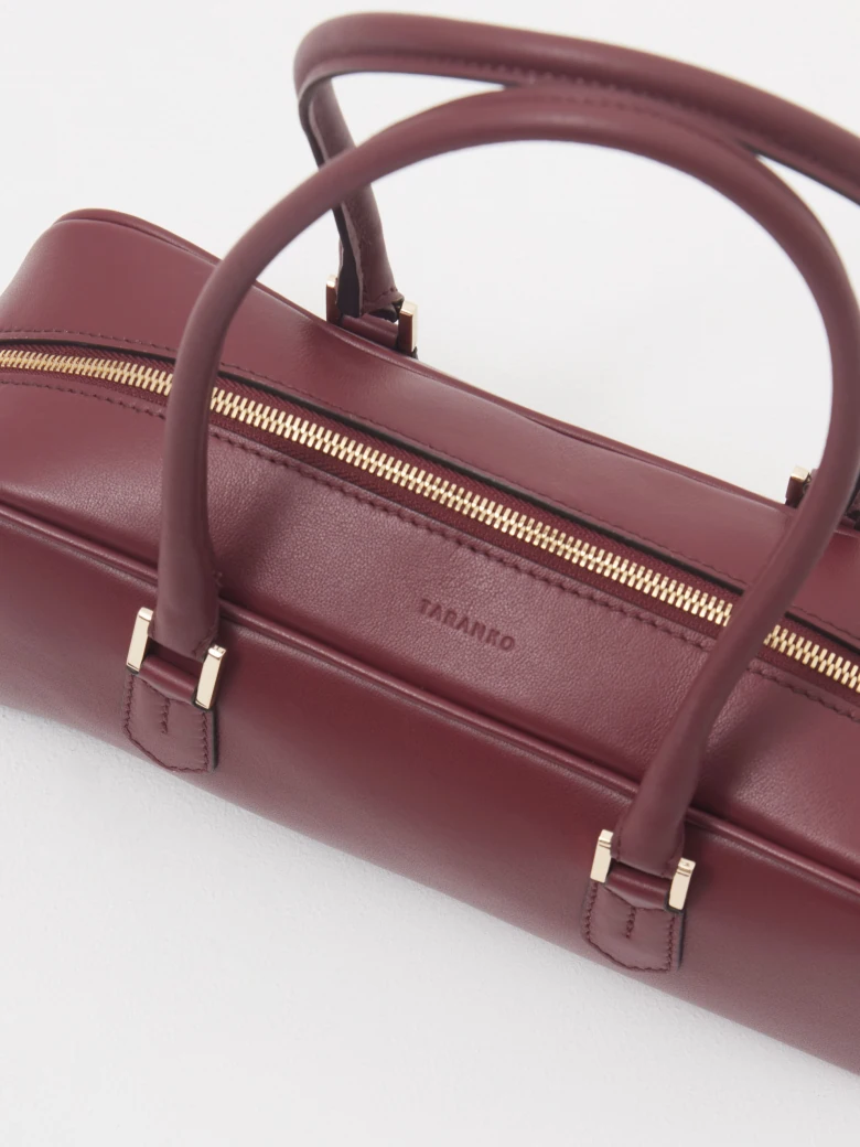 Burgundy leather baguette bag