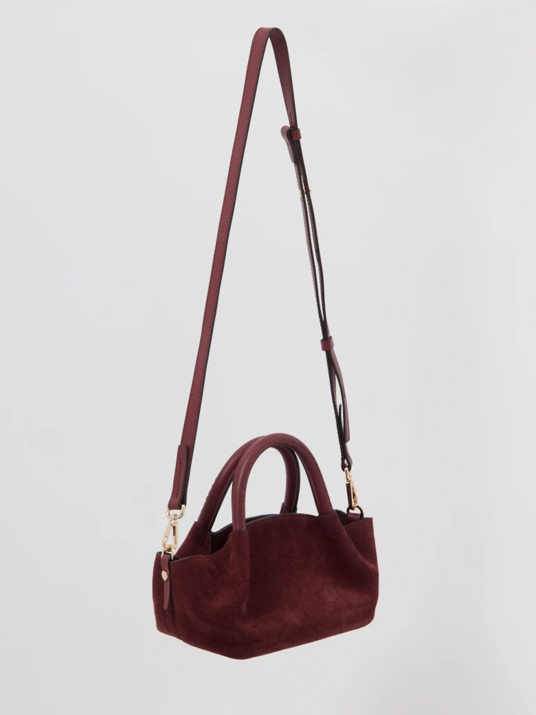 Suede handbag in burgundy