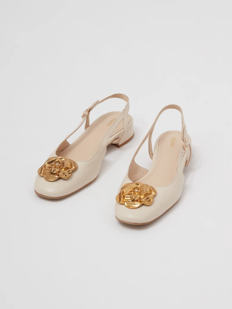 Leather ballerina flats with decorative flowers