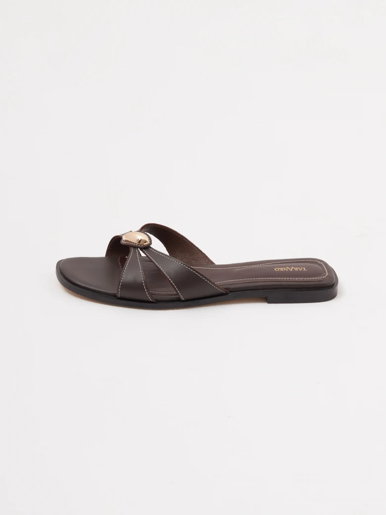 Brown leather flip-flops with decorative buckles