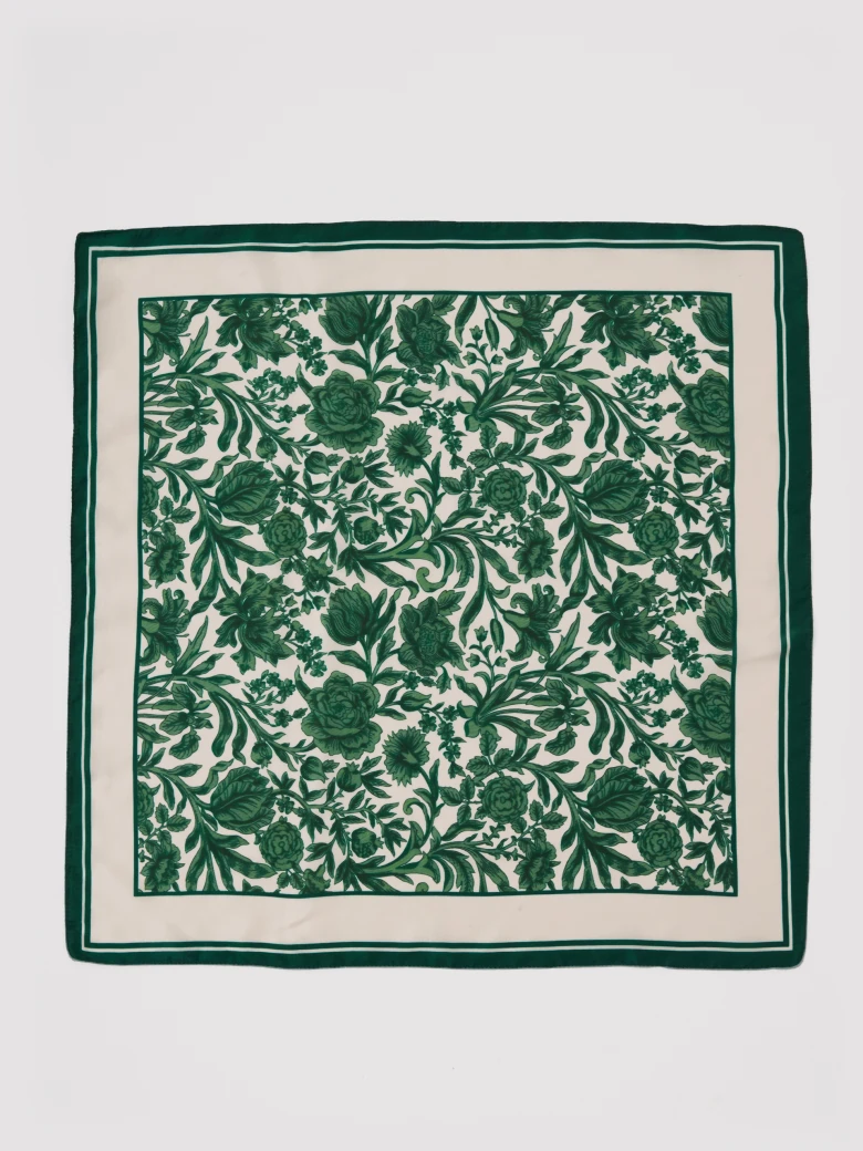 An elegant silk blouse with a floral print