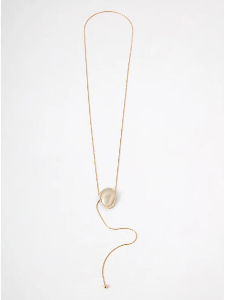 A gold-colored necklace with a pendant and a clasp